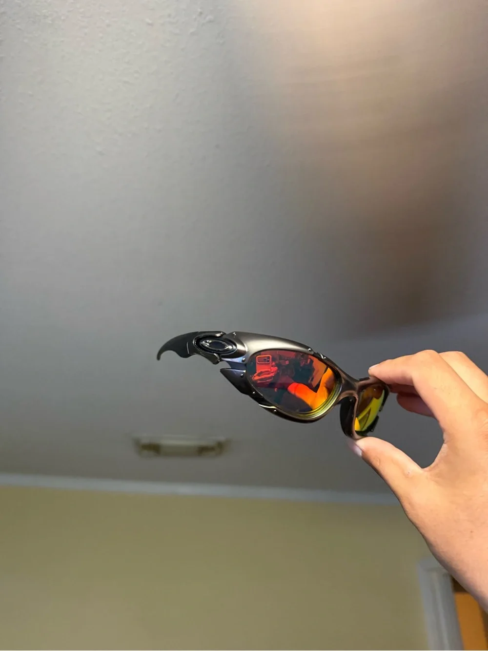 Oakley Men’s Black Frame Sunglasses with Red and Yellow Mirrored Lenses